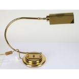 Large brass desk lamp, with curved neck and stepped circular foot, 54cm wide