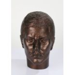 Bronzed male model head, with wooden base, 28cm high