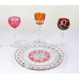 Baccarat wine glass, with orange overlaid bowl, together with a Royal Brierly cranberry hock