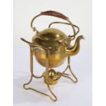 Arts and Crafts design Bavarian brass spirit kettle on stand, having wicker carrying handle, the