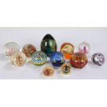 Collection of various glass and resin paperweights, to include a Mdina example, millefiori,