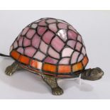 Tiffany style table lamp, in the form of a tortoise, with pink and orange shade, brass body, 20cm