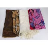 Four various ladies scarves, to include a tartan example, printed in black, white and burgundy