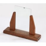 Art Deco style teak picture frame, raised on rectangular base, 23.5cm wide