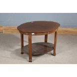 Art Deco walnut two tier table, having quarter veneered shaped top, 70.5cm wide x 50.5cm high
