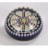 Perthshire polychrome millefiori cane paperweight, the central cane with depiction of a butterfly,