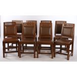 Derek "Lizardman" Slater set of eight oak dining chairs, each with a carved lattice top above a