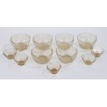 Set of six smoky bubble glass bowl, each of octagonal shape, together with five matching smaller