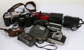 Collection of 35mm cameras, to include a Kodak Instamatic 300, Beirette, Canon, and others (qty)