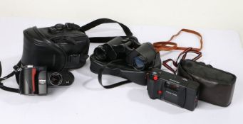 Nikon Coolpix 4500, together with a Pentax PC35 camera, and a pair of Panorama binoculars 8 x 30, in