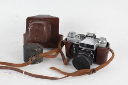 Zenit-E camera, with a Helios-44-2 f/2 58mm lens and a Prinz Galaxy Auto 3X Converter