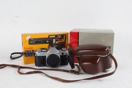 Cano AT-1 boxed camera body, together with a boxed Kodak Tele-Ektralite 600 camera, Kodak