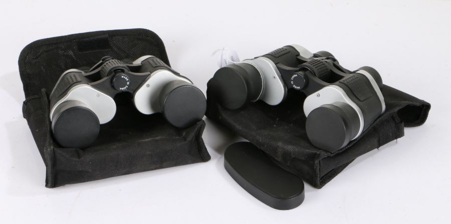 Two pair of Bosch Optikon binoculars, cased (2)