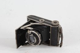 F. Decker Munchen folding camera, with a Trioplan Compur f/2.9 75mm lens