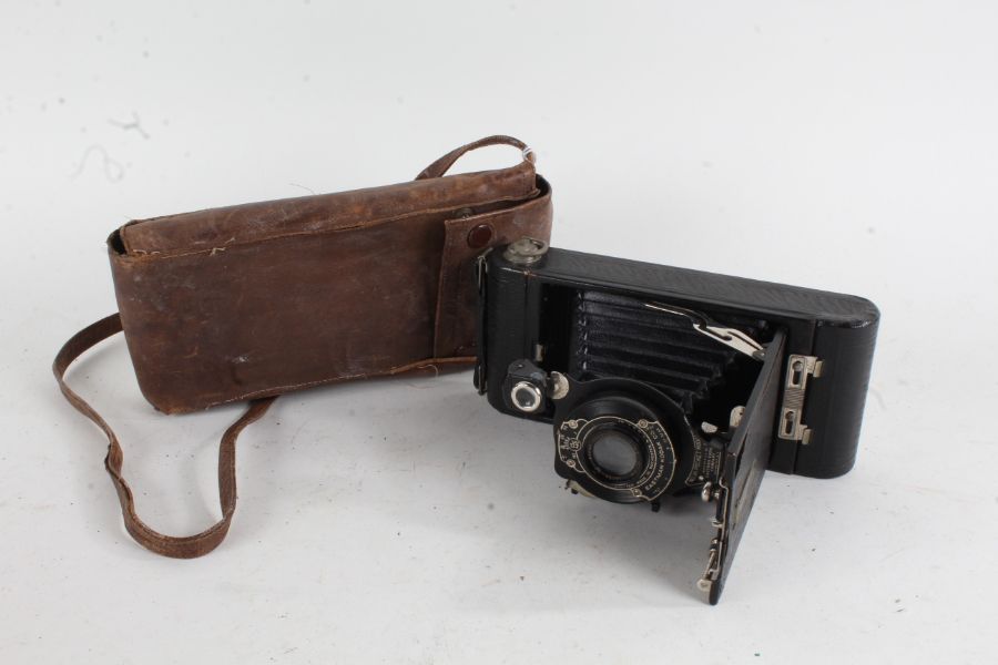 Kodak 1A Pocket folding camera, f/6.3 127mm lens, housed in a leather case