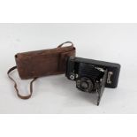 Kodak 1A Pocket folding camera, f/6.3 127mm lens, housed in a leather case