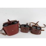 Three pars of binoculars, to include a Beck Hassel Jagdfalke 7x50, and two early 20th Century