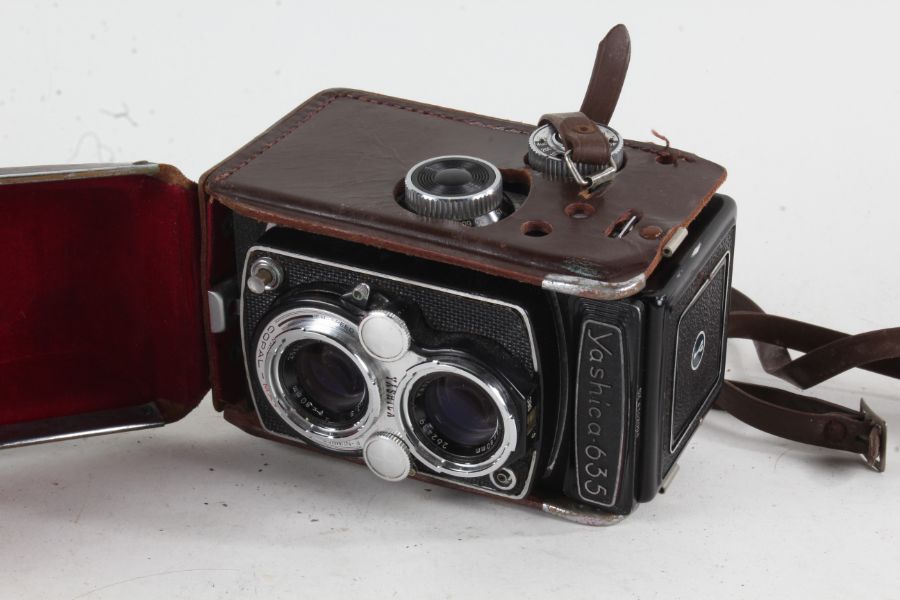 Yashica Reflex 635 twin lens camera, f/3.5 80mm lens, housed in a leather case