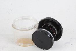 Carl Zeiss Pro-Tessar f/3.2 35mm lens, housed in a bubble case