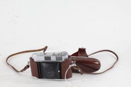Kodak Retina II C camera, with a Schneider-Kreuznach Retina-Xenon C f/2.8 50mm lens, in a leather