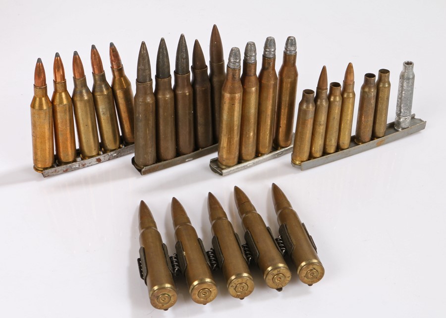 Clips of rounds, various calibres, together with a short belt of 5 linked machine gun rounds, inert,
