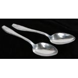 A pair of aluminium table spoons, engraved with 'SS' runes on the handle and stamped 'Aluminium'