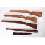 Selection of wooden rifle stocks, (5)