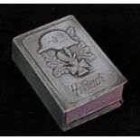 White metal Matchbox cover, emblazoned with oakleaves, Iron Cross and German steel helmet motif