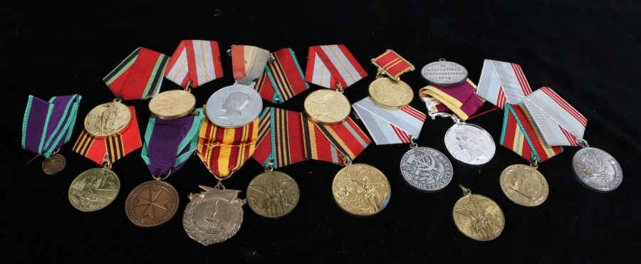 Selection of post Second World War Russian commemorative medals, together with a reproduction