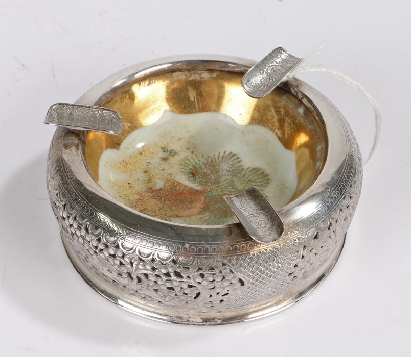 Vietnam silver ashtray, the porcelain dished centre with goldfish decoration surrounded by a pierced