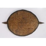 Sudan shield, with an African soft shell turtle shell and iron two prong handle to the interior,