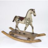 19th Century English toy rocking horse, circa 1870, dapple colour with a leather saddle raised on