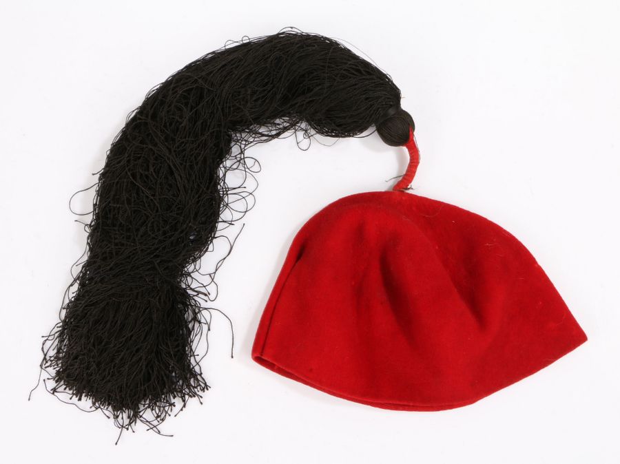 Greek fez-fesi, with long black tassels and red cap. Provenance; From the Marietta Pallis Greek