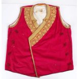 Greek bullion waistcoat, with vibrant gilt thread tot he collar and edge to the purple coat.