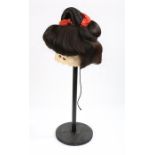 Late 19th Century Japanese Geisha wig, with the hair set in the traditional way and a metal frame to