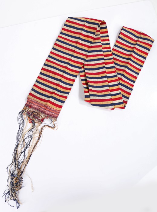 Greek silk belt, the long belt with rows of white, blue, yellow and red stripes and tassel ends,