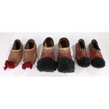 Three pairs of Greek Opanke Tsarouhi Pom-Pom shoes, the first pair with black pom-poms and deep