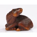 Japanese wood Netsuke of a horse, by Sari, Iwashiro Province, 19th century, signed in an oval to the