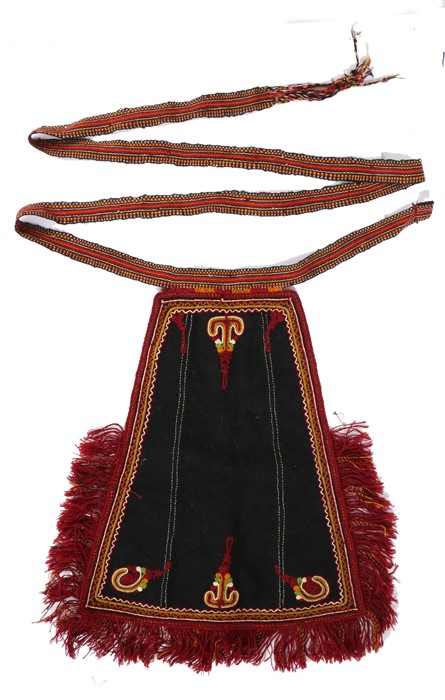 Greek apron, with a deep red edge and multicoloured trim to the scroll wool designs to the black