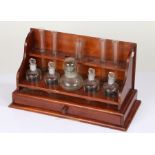 Early 20th Century mahogany chemistry test rack, two shelves above a drawer, to include bottles,