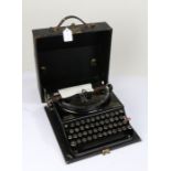 Smith Premier Chum Portable type writer, housed in a travelling case