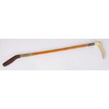 Mid 20th Century riding crop, with a white metal collar and tapering body, 53cm long