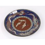 Japanese cloisonné enamel plate, with storks to the centre on a brown ground, circled by two dragons