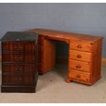Pine desk, the rectangular top above eight graduated drawers, raised on bun feet, 126cm wide,
