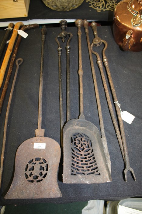 Pair of steel fire irons, painted in black, and three other steel fire irons (5)