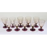 Set of ten modern amethyst wine glasses, with smoky tapering bowls and amethyst circular feet,