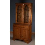 Pine bookcase cabinet, the cabinet with glazed doors enclosing two shelves, above the base with