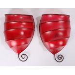Pair of 20th century skin wall lights, in red with metal frames, 34cm high (2)