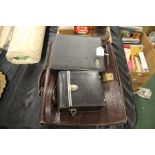 Ptt Post leather messenger bag, together with a cased Cowley level and a cased gold meter (3)