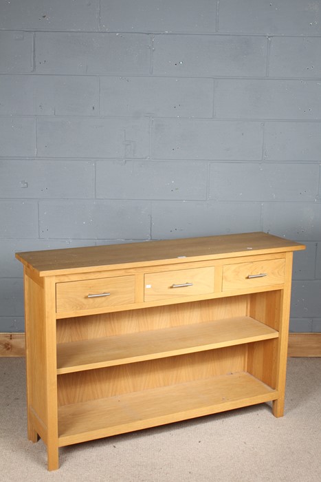 Light oak sideboard, the rectangular top with three frieze drawers, above an open shelf, raised on - Image 2 of 3